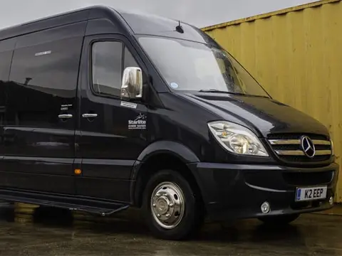 Black Mercedes party bus
